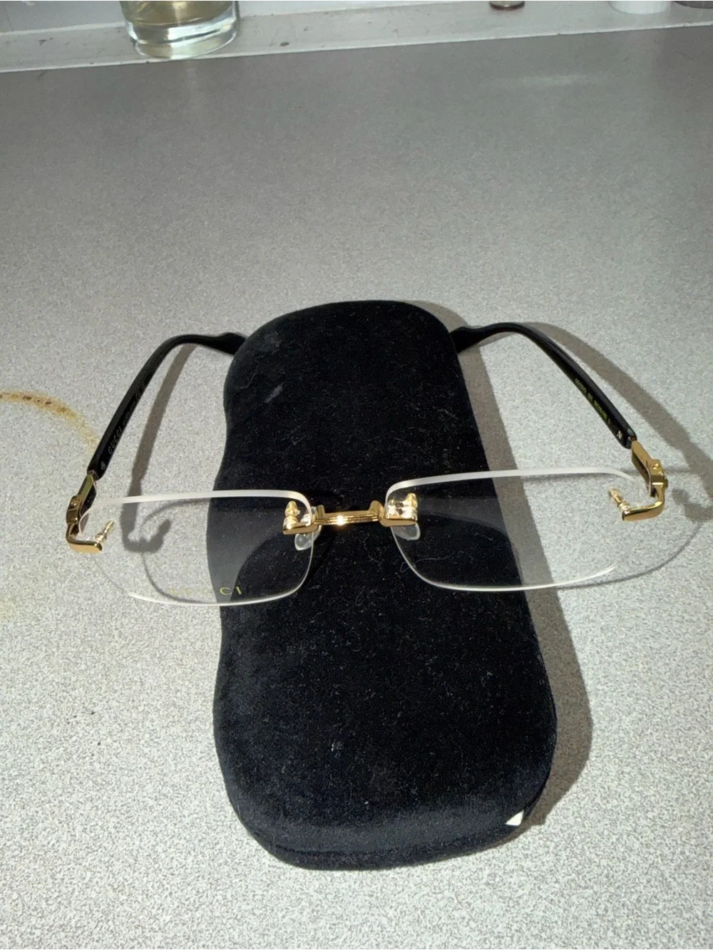Gucci Men’s Rimless Eyeglasses Gold and Black Accents